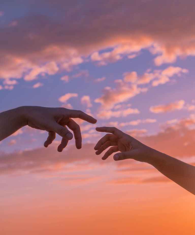 People reaching hands to each other thriving relationship