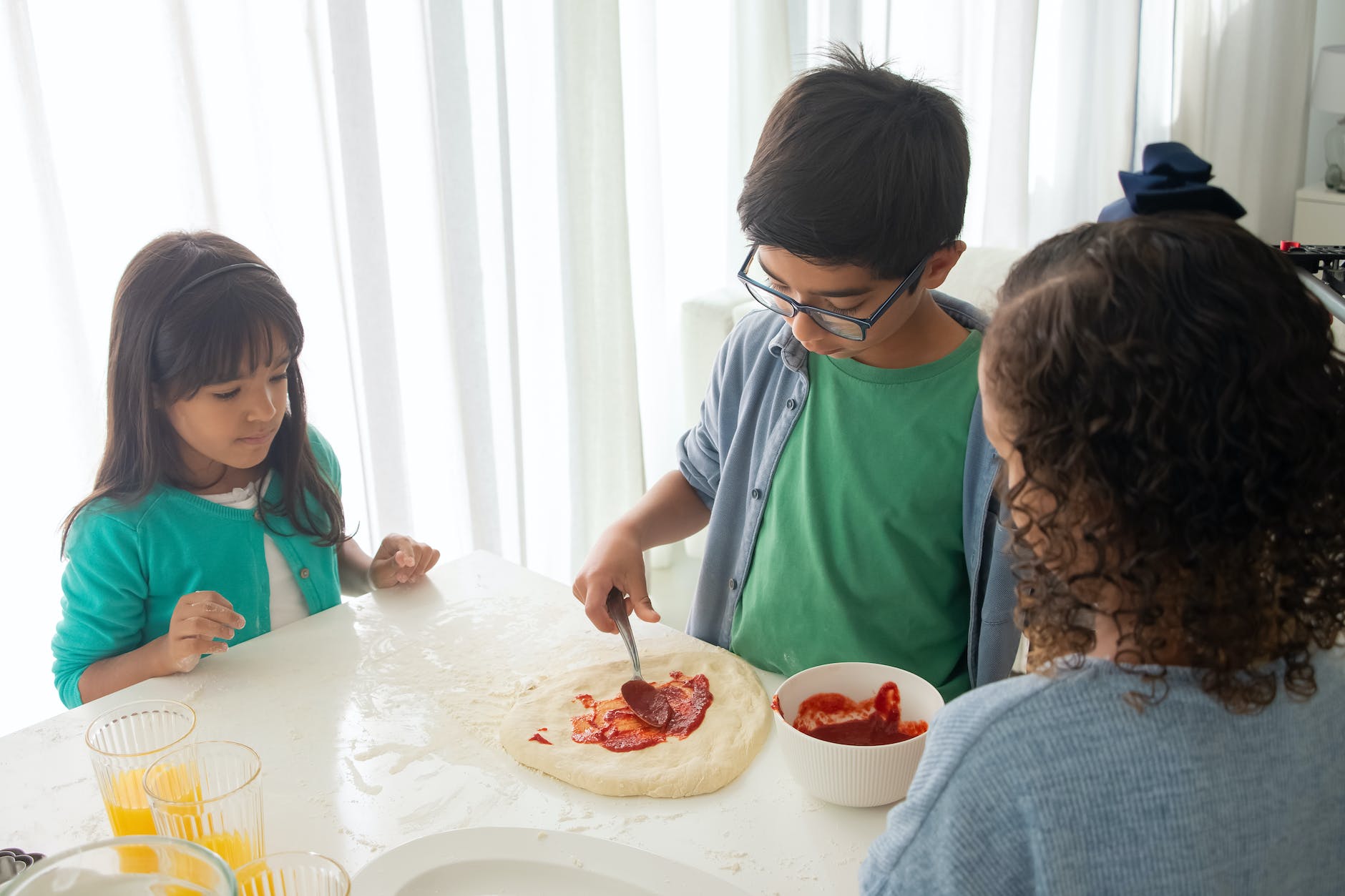 Children making pizza together kid friendly recipes
